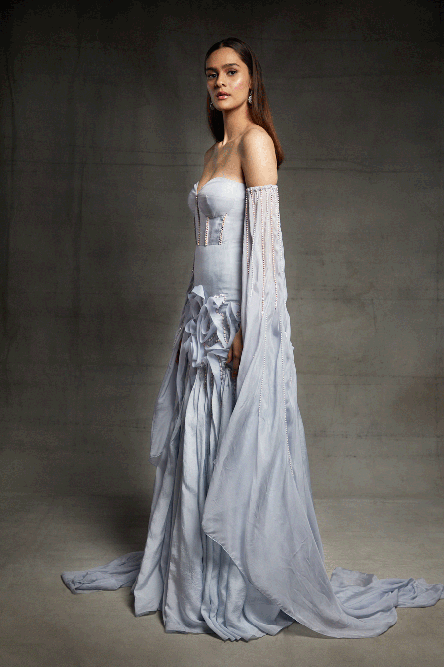 Ice Blue Embroidered Ruffle Gown With A Floor Length Drape On Both Side