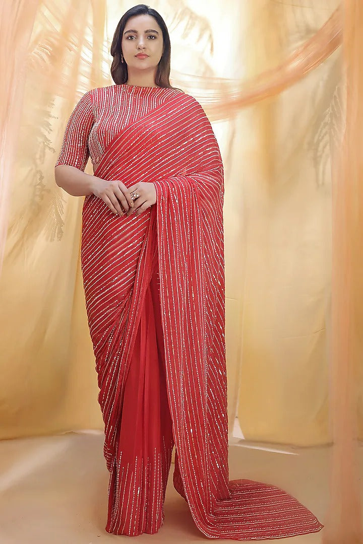 Hot red saree with elbow sleeve blouse