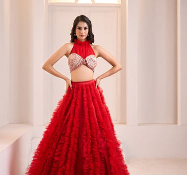 Red Embroidered Halter Neck Mashru Blouse with Ruffle Lehenga and Potli Bag