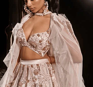 Nude Embroidered Lehenga Set With Ruffle Cape