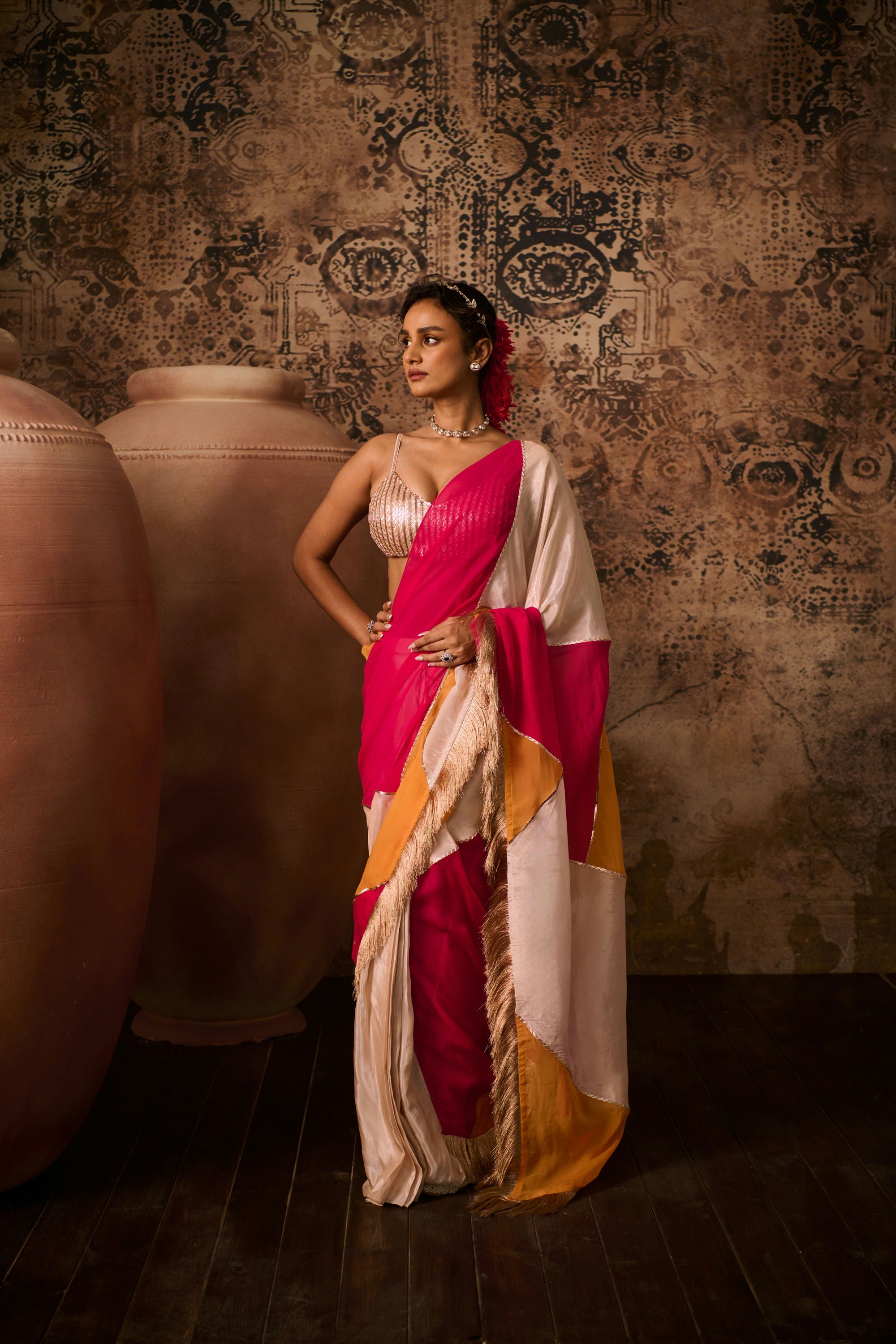 Rose gold embroidered blouse with multicoloured saree