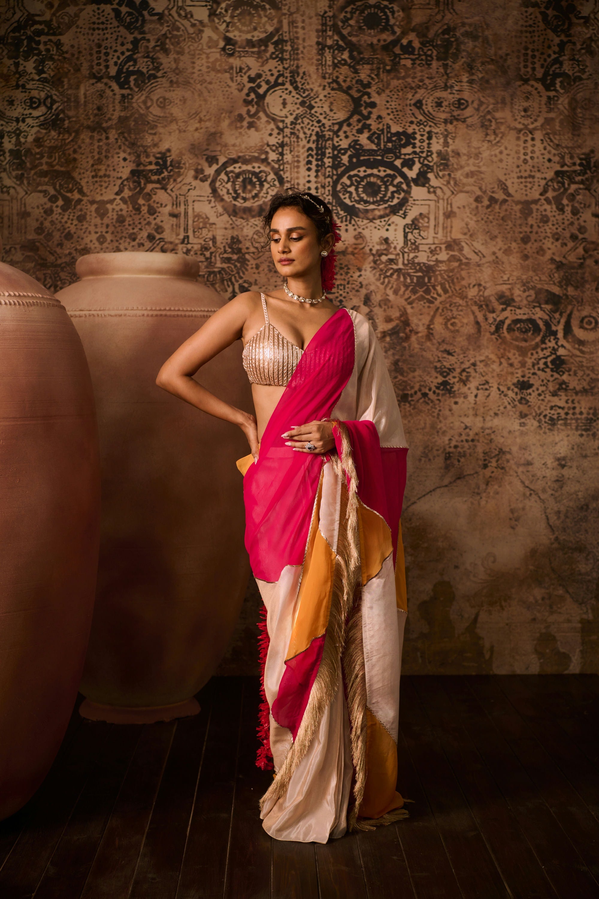 Rose gold embroidered blouse with multicoloured saree