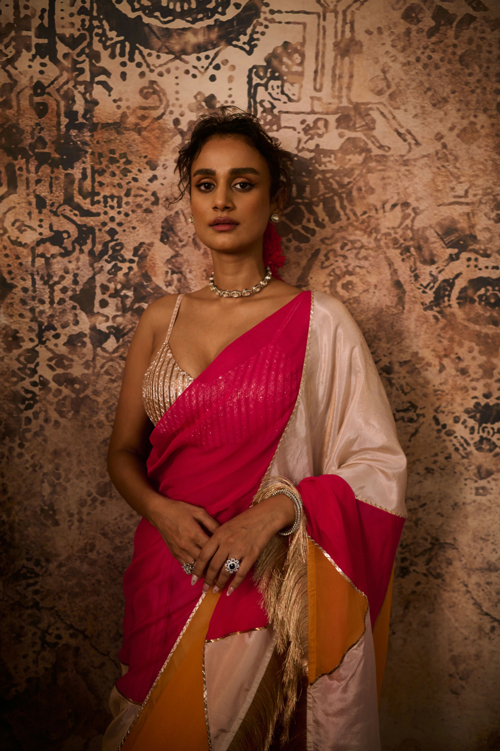 Rose gold embroidered blouse with multicoloured saree