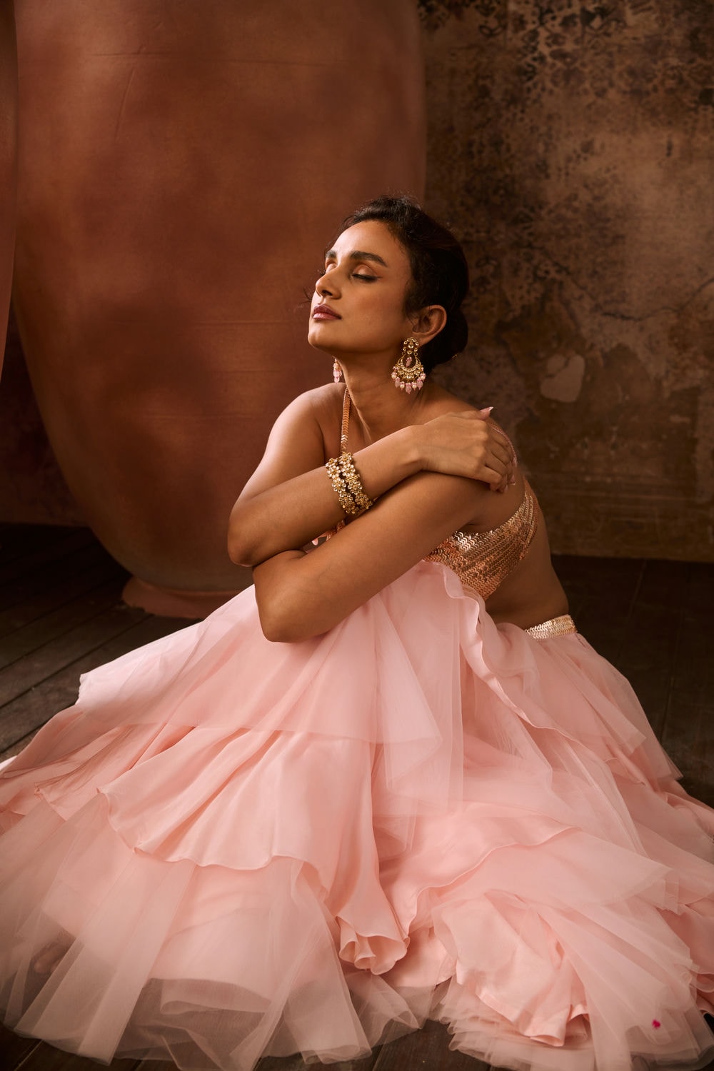 Rose gold embroidered top with pink layered skirt