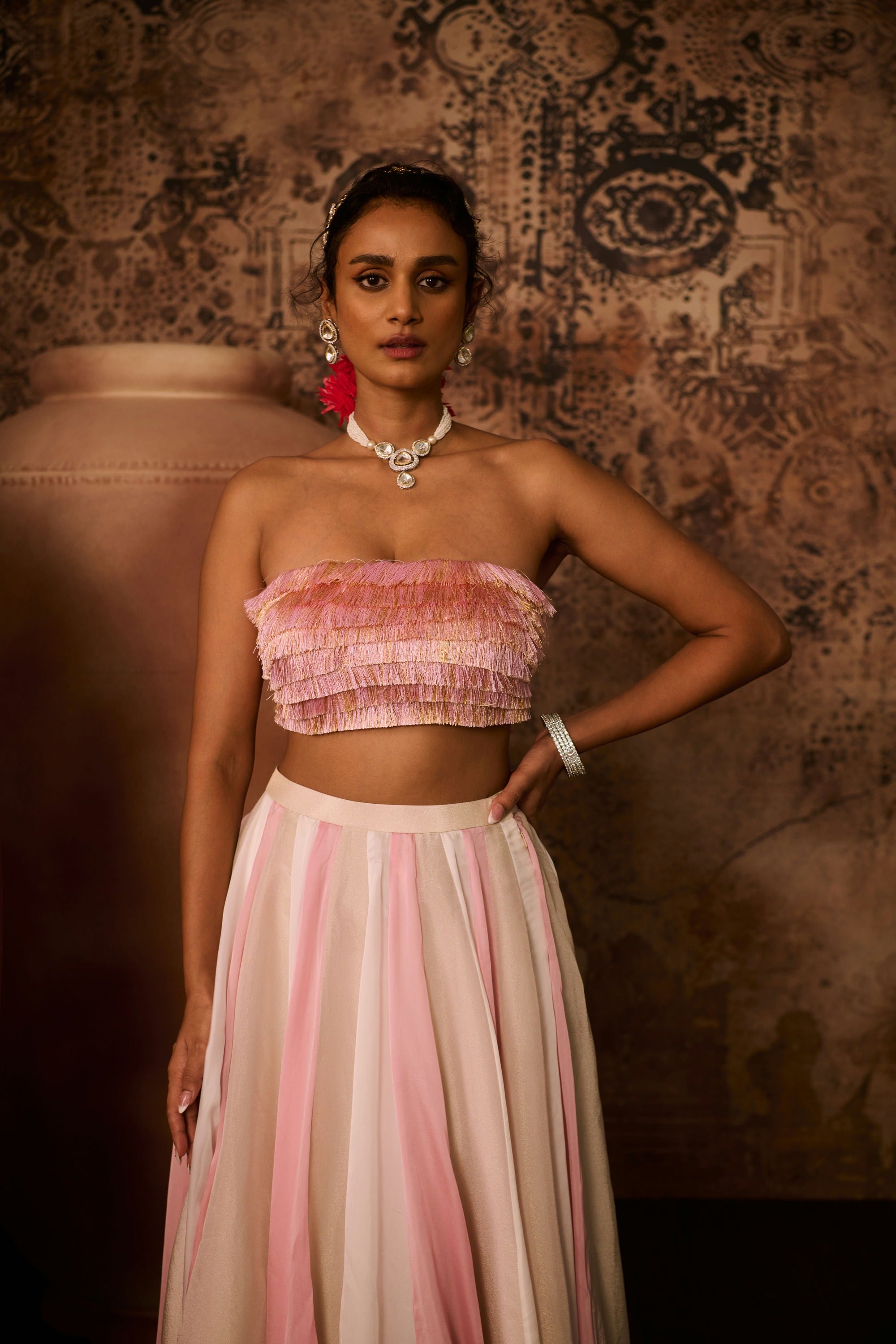 Pink embroidered top with multiple coloured skirt