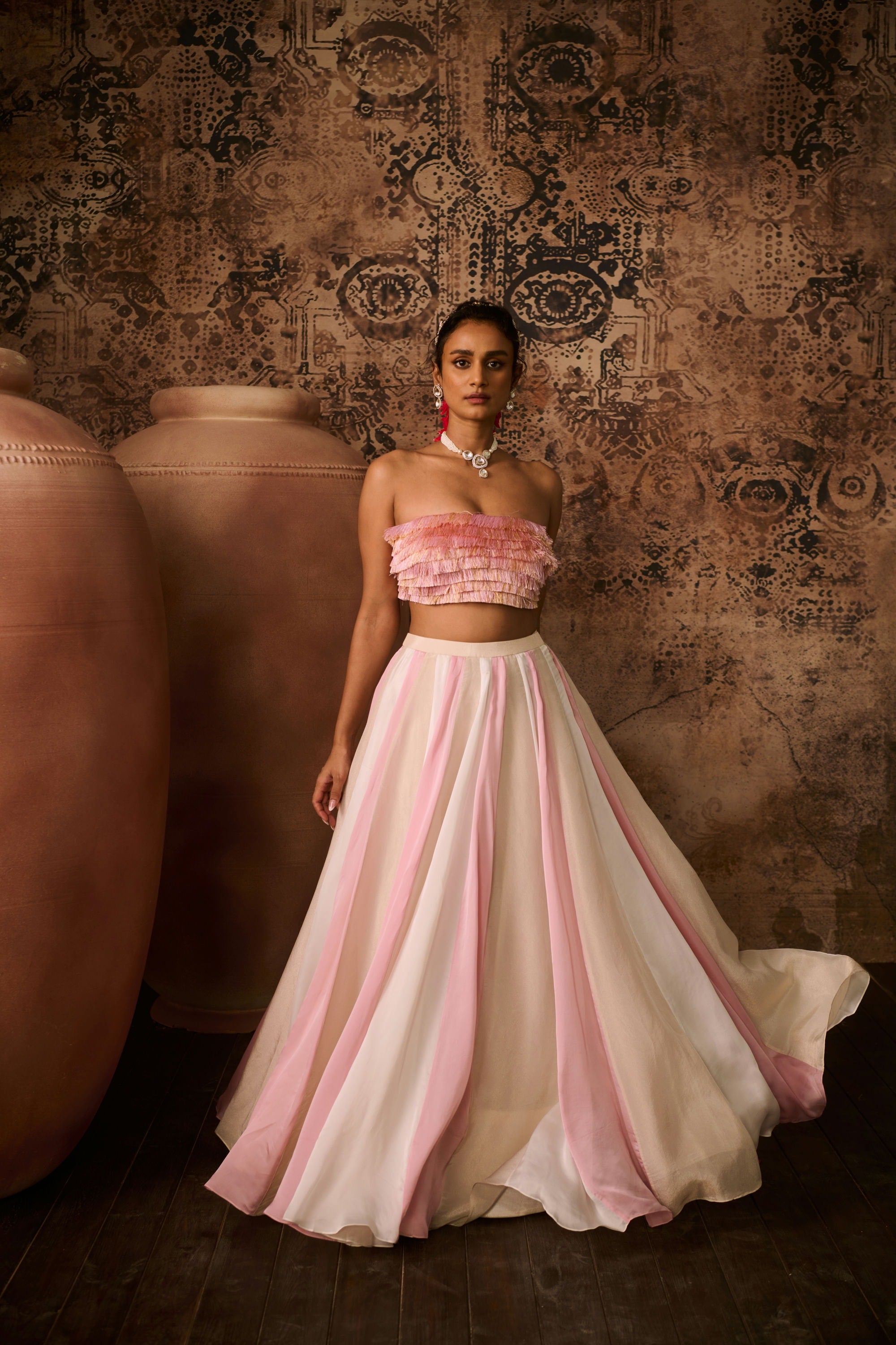 Pink embroidered top with multiple coloured skirt