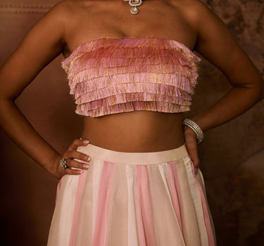 Pink embroidered top with multiple coloured skirt