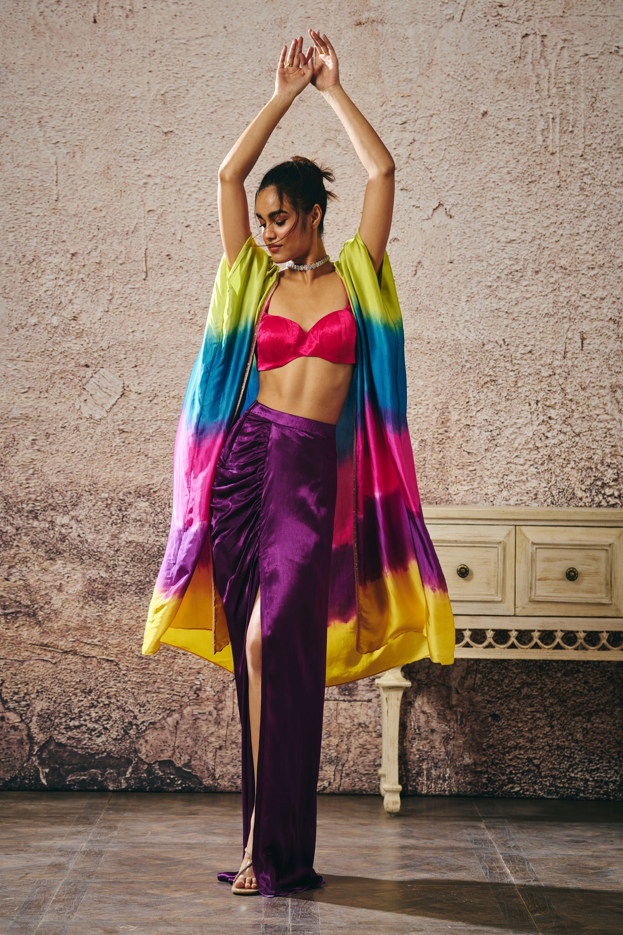 HOT PINK BLOUSE AND PURPLE SKIRT WITHOMBRE SHRUG