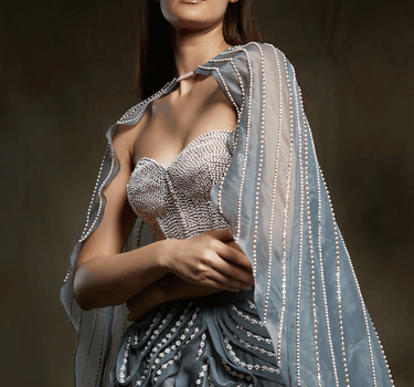 Grey Ruffle Embroidered Lehenga With Corset And Cape