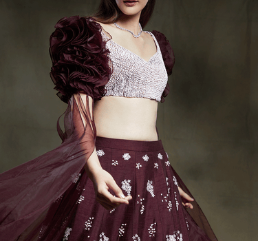 Wine Embroidered Lehenga With Ruffle Sleeve Blouse And Floor Length Drape