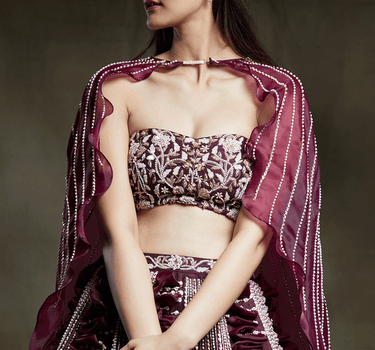 Wine Embroidered Bridal Lehenga With Embroidered Blouse And Cape