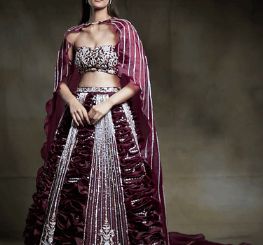 Wine Embroidered Bridal Lehenga With Embroidered Blouse And Cape