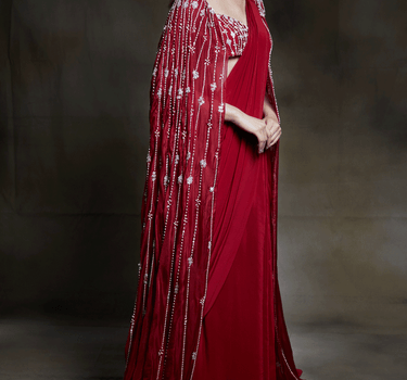 Crimson Embroidered Bustier With Pre Draped Saree And A Fully Embroidered Cape