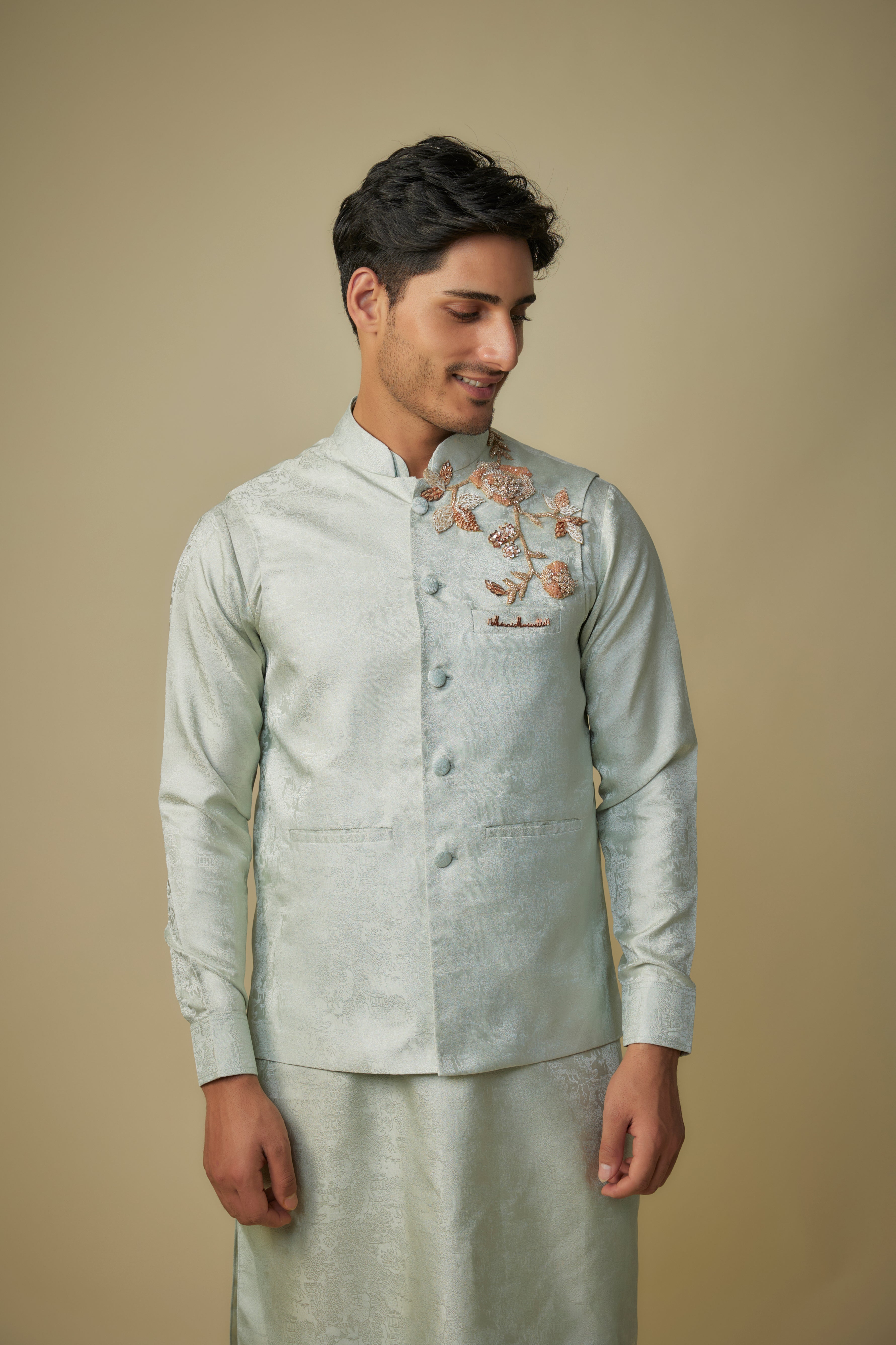 sage green embroiderd bundi with kurta and pant