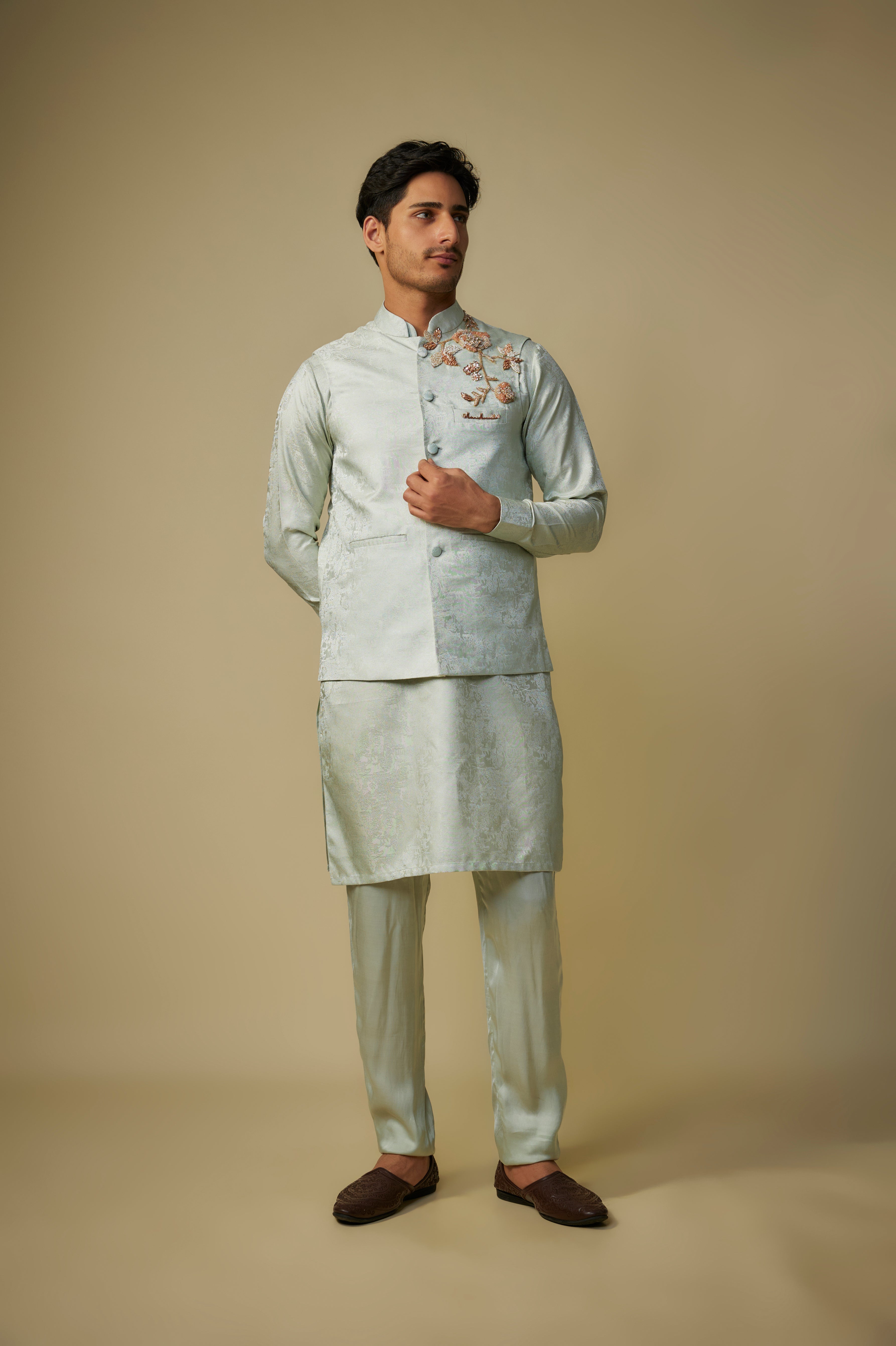 sage green embroiderd bundi with kurta and pant