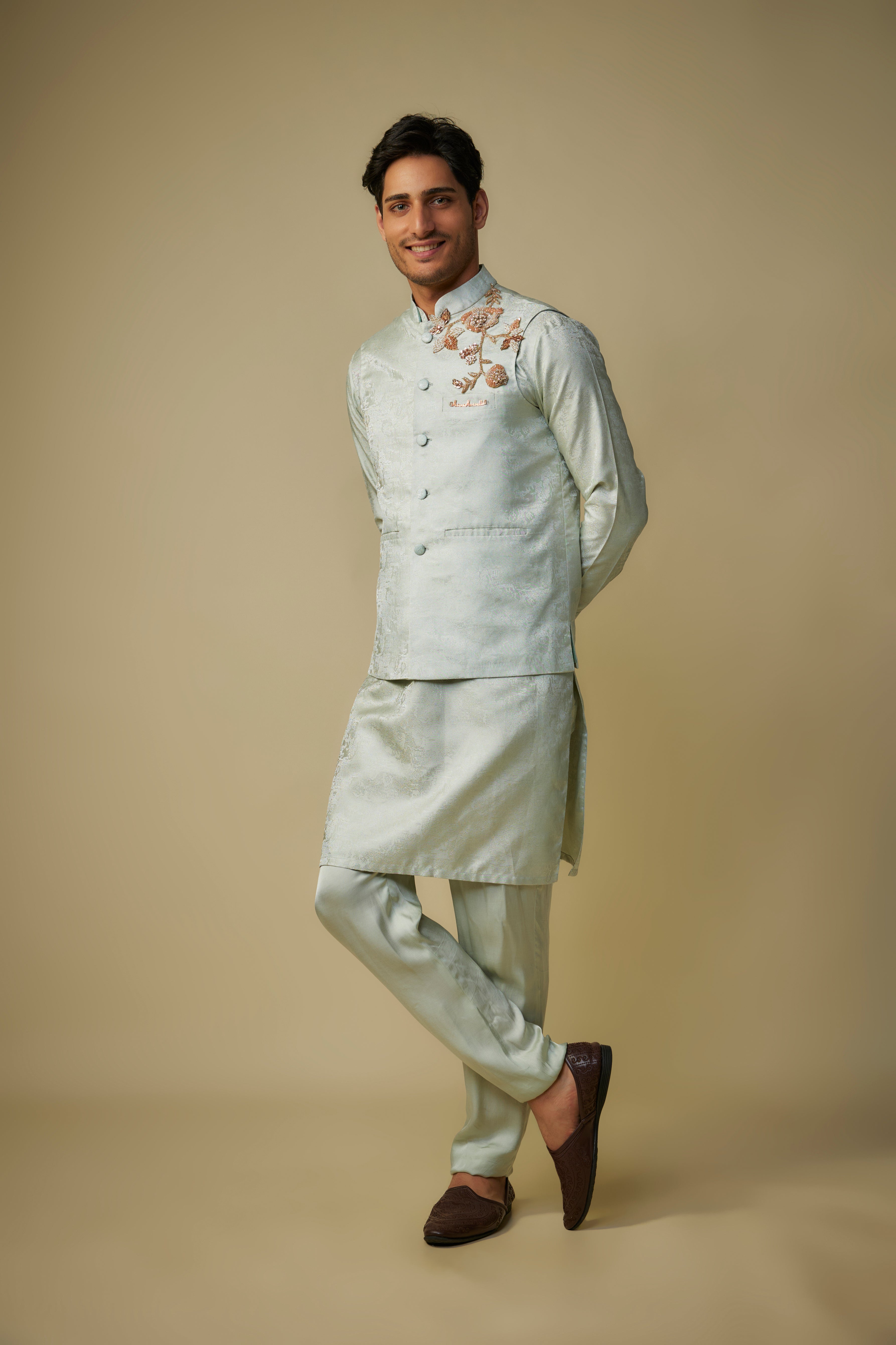 sage green embroiderd bundi with kurta and pant