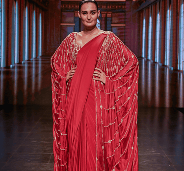 Crimson Embroidered Bustier With Pre Draped Saree And A Fully Embroidered Cape